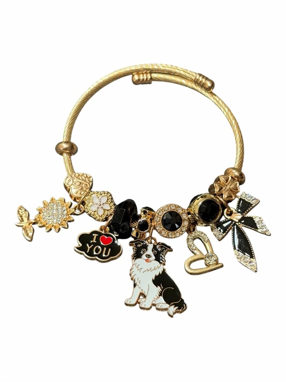 Gold Tone Charm Adjustable Twisted Bangle W/Black & White Dog and Heart Charms